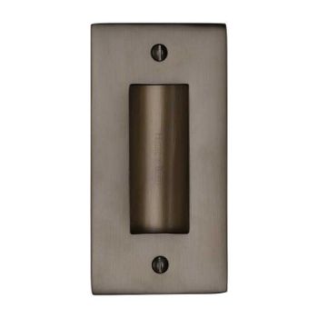 Flush door handle for sliding doors and pocket doors in matt bronze finish Flush door handle for sliding doors and pocket doors in matt bronze finish