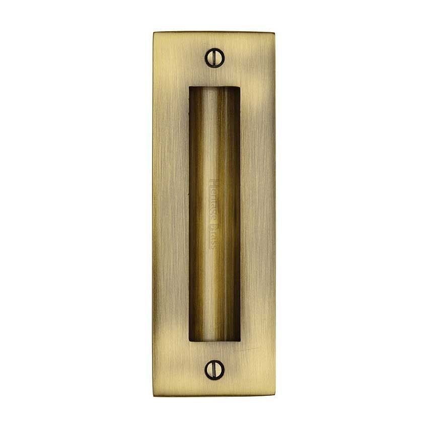 Flush door handle for sliding doors and pocket doors in antique brass finish
