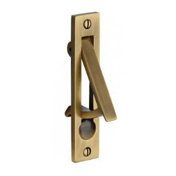 Sliding door and pocket door edge pull in antique brass finish. Sliding door and pocket door edge pull in antique brass finish.