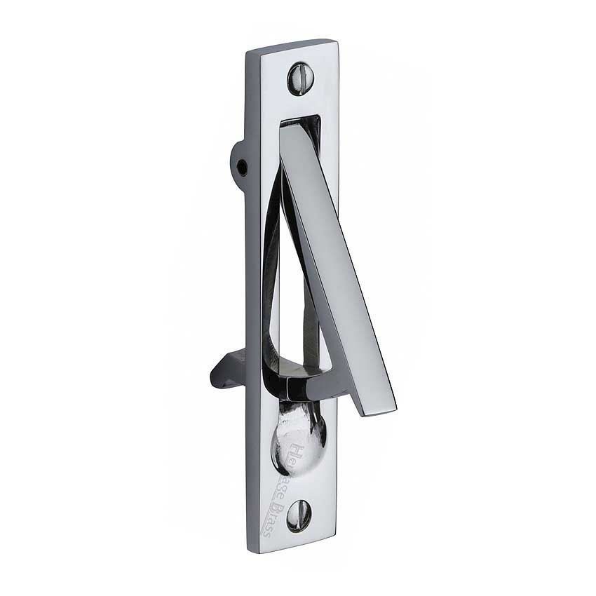 Sliding door and pocket door edge pull in polished chrome finish.