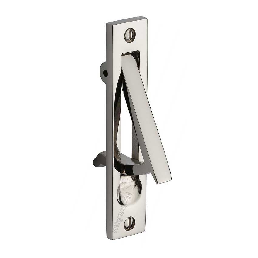 Sliding door and pocket door edge pull in polished nickel finish.