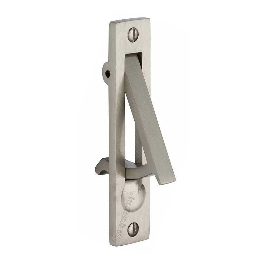 Sliding door and pocket door edge pull in satin nickel finish.