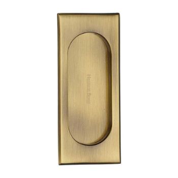 Flush door handle for sliding doors and pocket doors in antique brass finish Flush door handle for sliding doors and pocket doors in antique brass finish