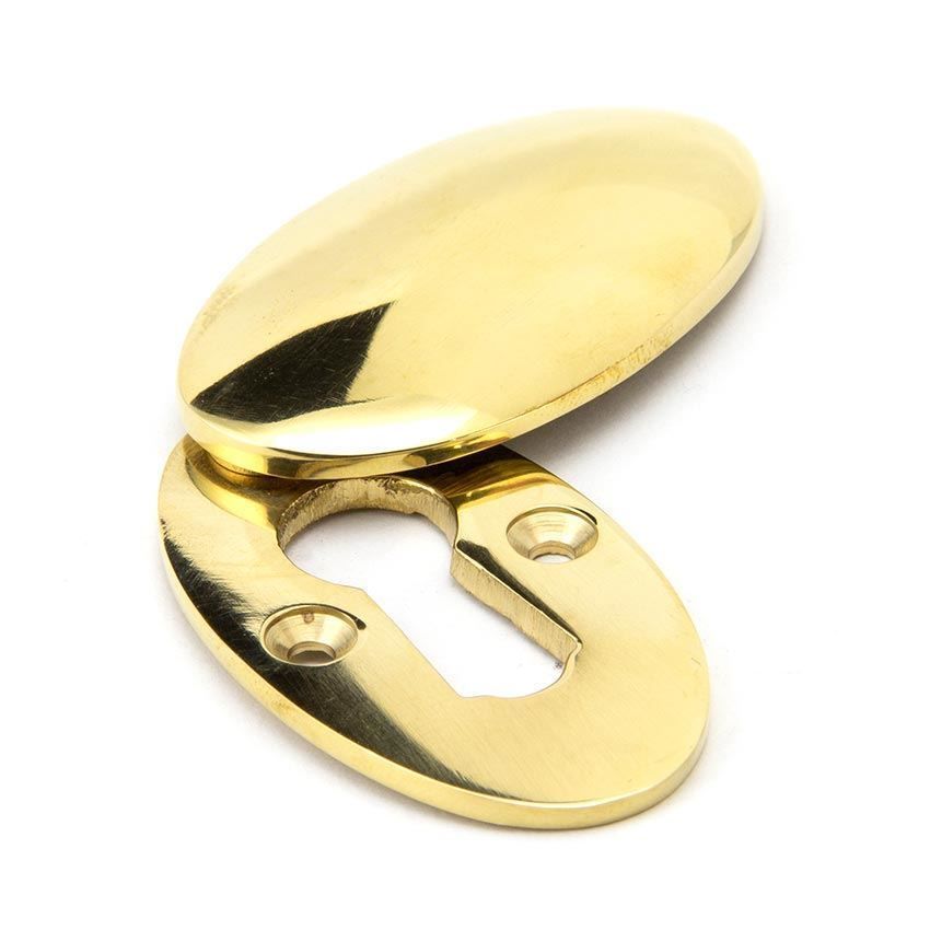 Period Oval Escutcheon and Cover in Polished Brass - 91987 