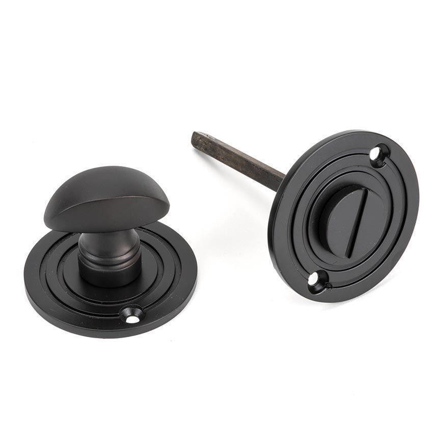 Round Bathroom Thumb turn in Aged Bronze - 83958