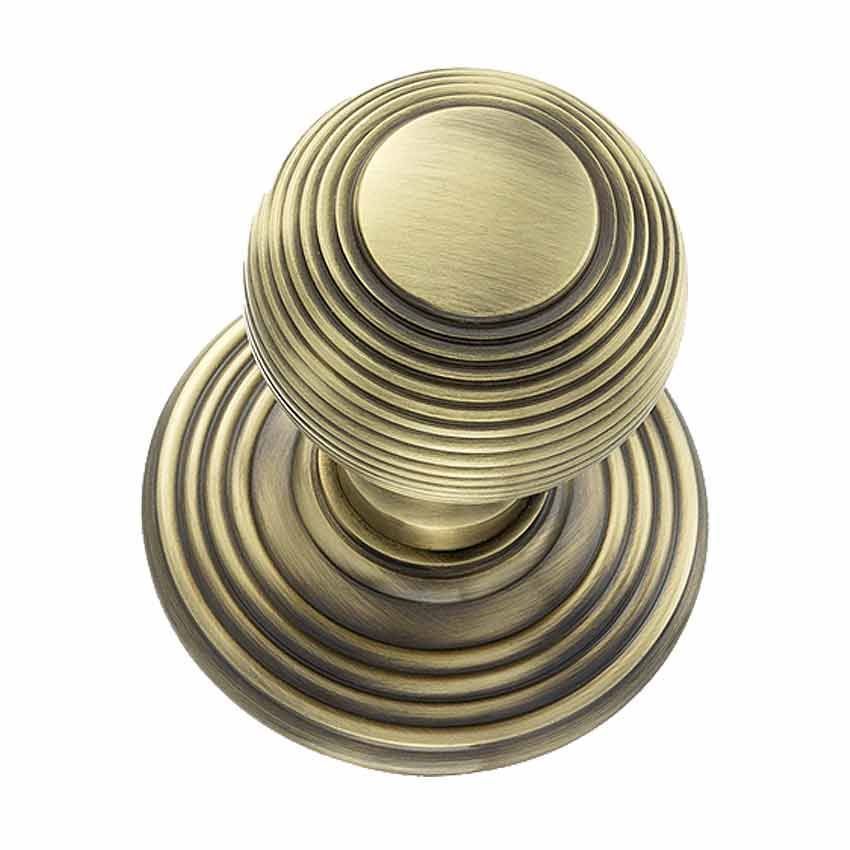 Ripon Round Reeded Door Knob in Antique Brass - OE50RMKAB