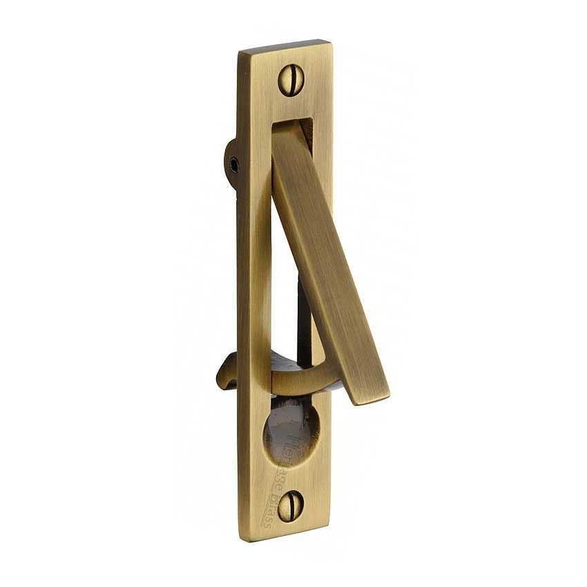 Sliding door and pocket door edge pull in antique brass finish.