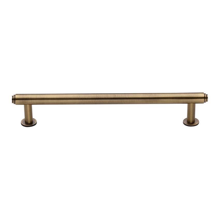 Step Cabinet Pull Handle on a Rose in an Antique Brass Finish - V4411-AT