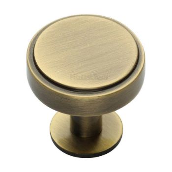 Stepped Disc Cabinet Knob on a Rose in Antique Brass - C3954-AT  Stepped Disc Cabinet Knob on a Rose in Antique Brass - C3954-AT