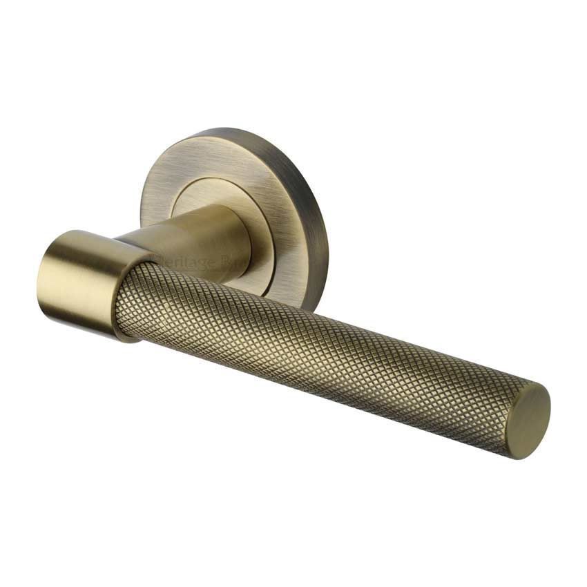 Phoenix Knurled Door Handle on Round Rose in Antique Brass - RS2018-AT