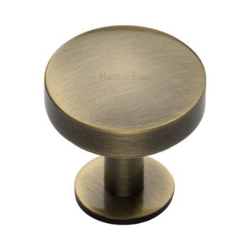Domed Disc Cabinet Knob with Rose in Antique Brass - C3878-AT  Domed Disc Cabinet Knob with Rose in Antique Brass - C3878-AT