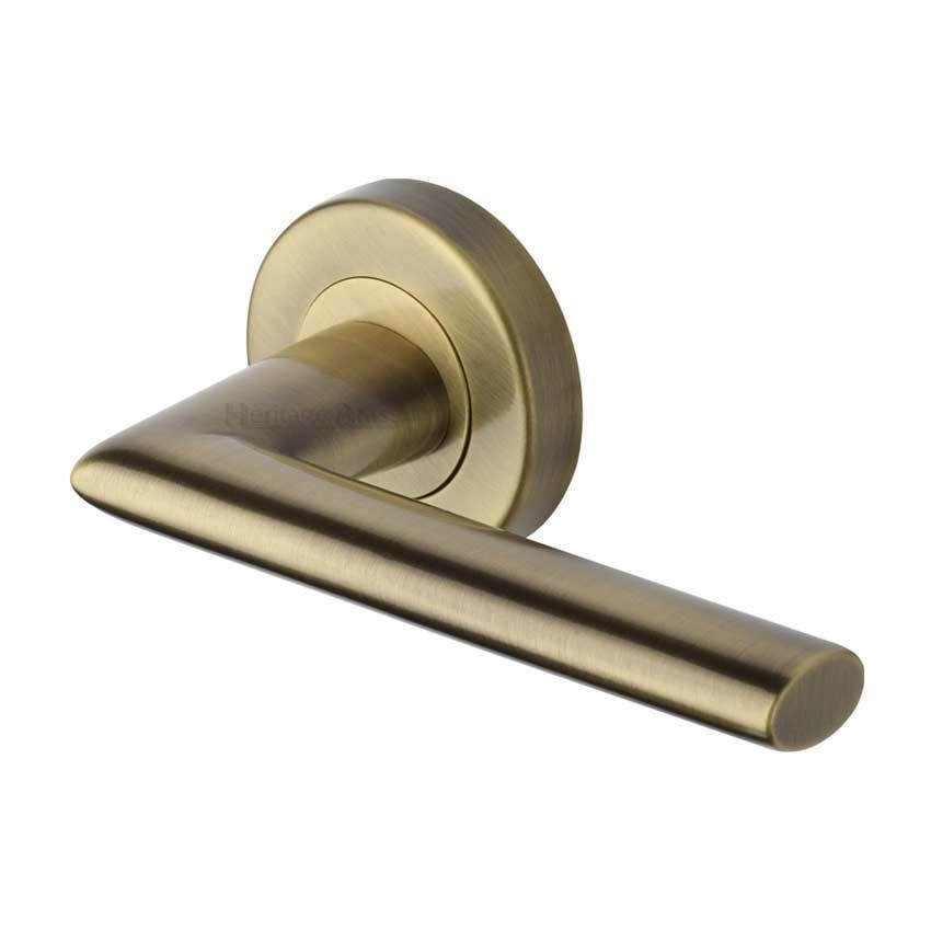 Admirality Door Handle on Round Rose in Antique Brass - V2355-AT