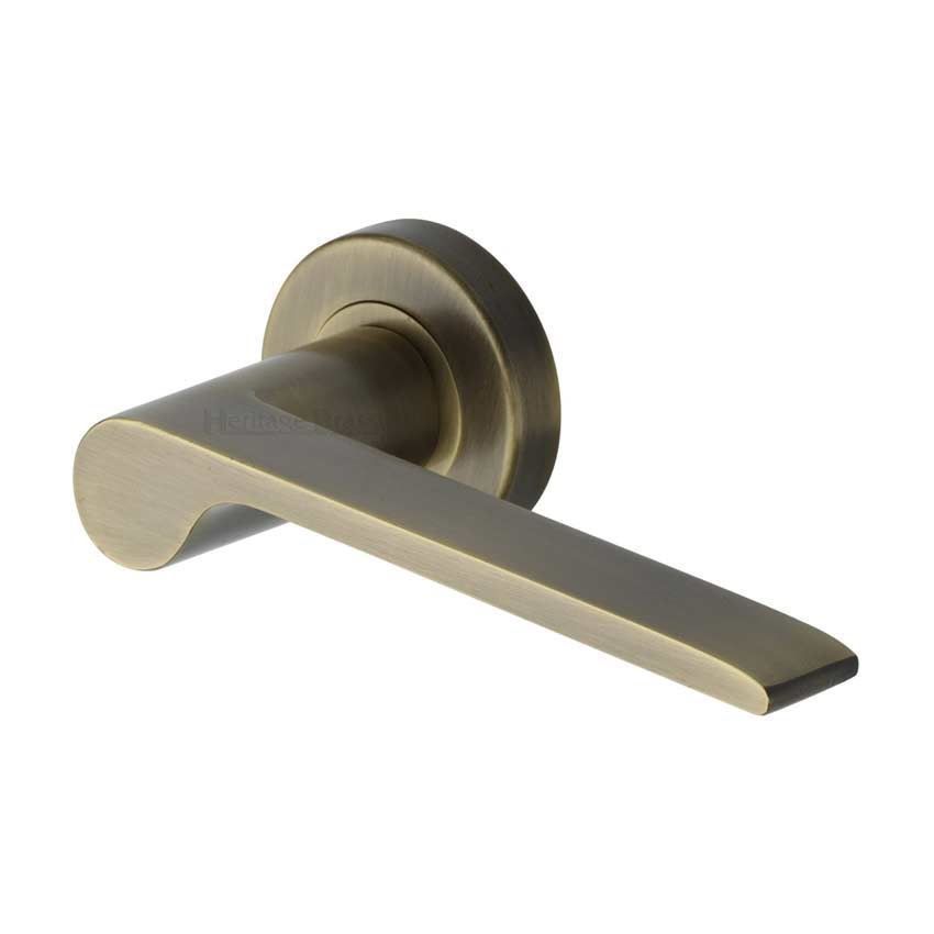 Julia Door Handle on Round Rose in Antique Brass - V4190-AT