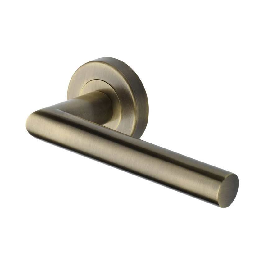 Athena Door Handle on Round Rose in Antique Brass - V3840-AT