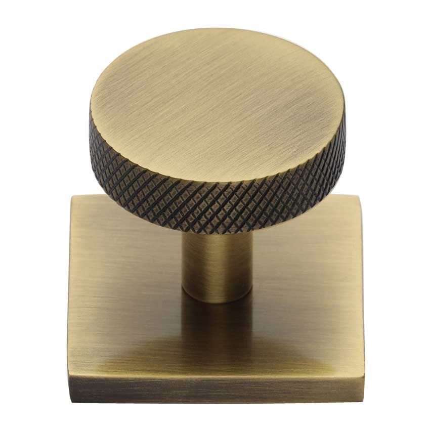 Disc Knurled Design Cabinet Knob on a Square Backplate in Antique Brass - SQ3884-AT