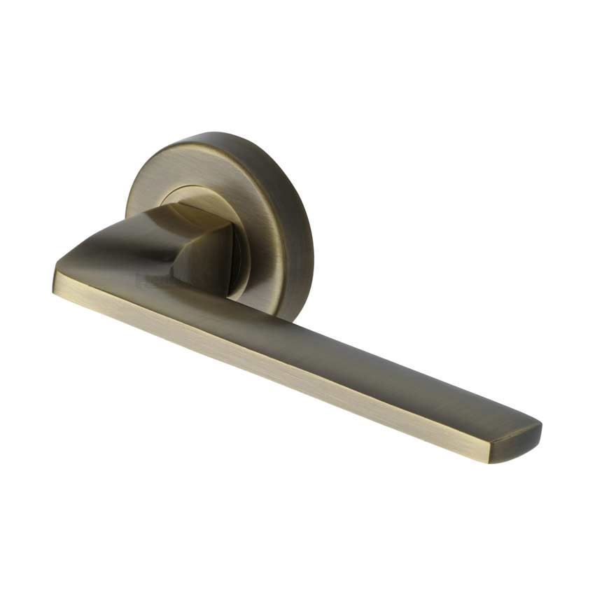 Metro Angled Door Handle on Round Rose in Antique Brass - V3790-AT 