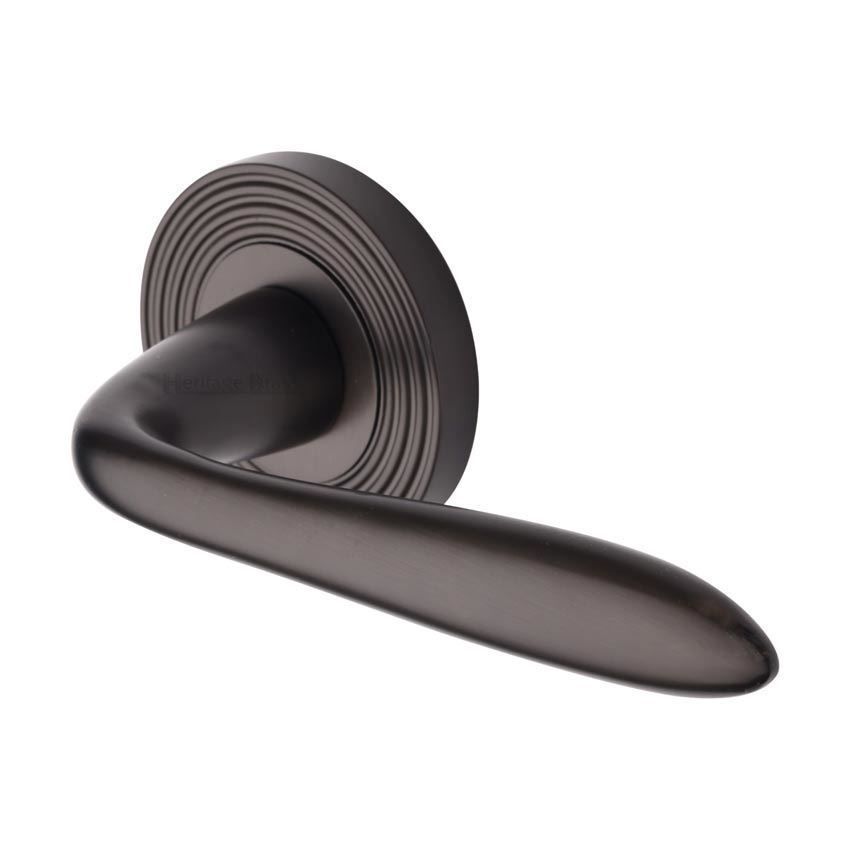 Sutton Reeded Door Handle on a Rose in Matt Bronze - RR1752MB