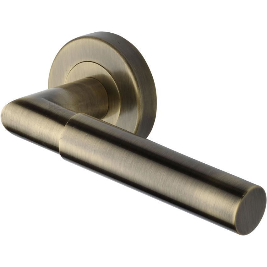 Bauhaus Mitre Door Handle on Round Rose in Antique Brass - V2270-AT