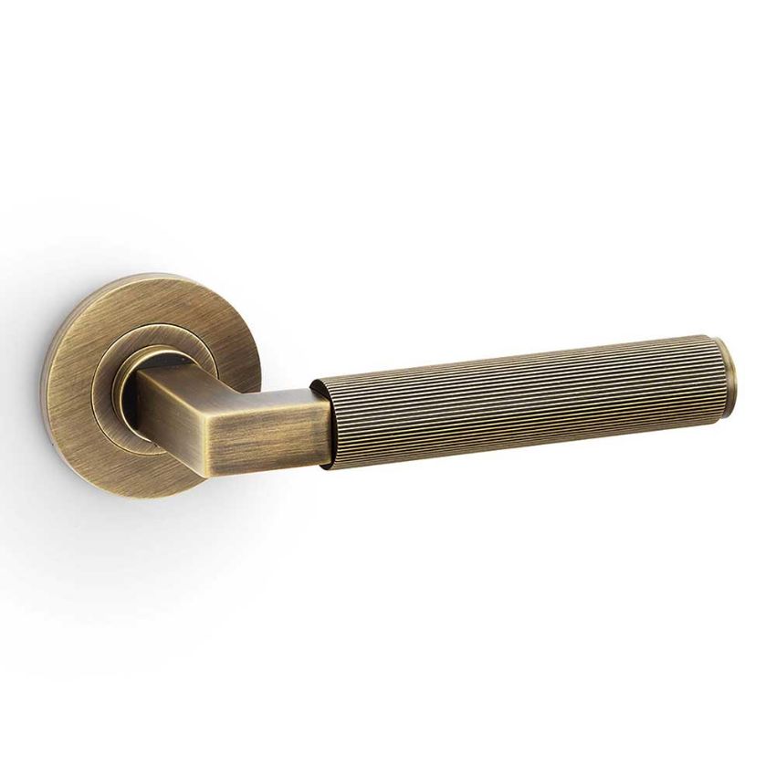 Picture of Alexander and Wilks - Hurricane Reeded Door Handle on Round Rose - AW202AB