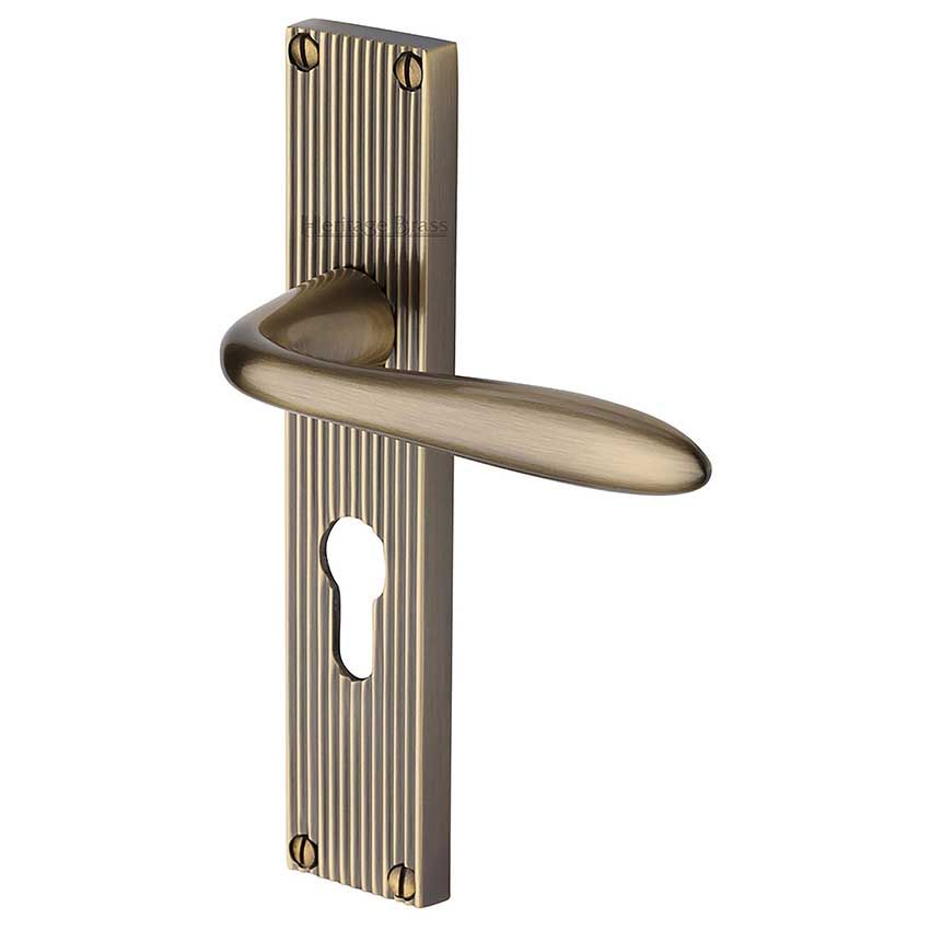 Picture of Sutton Reeded Euro Profile Door Handles In Antique Brass Finish - RR5048-AT