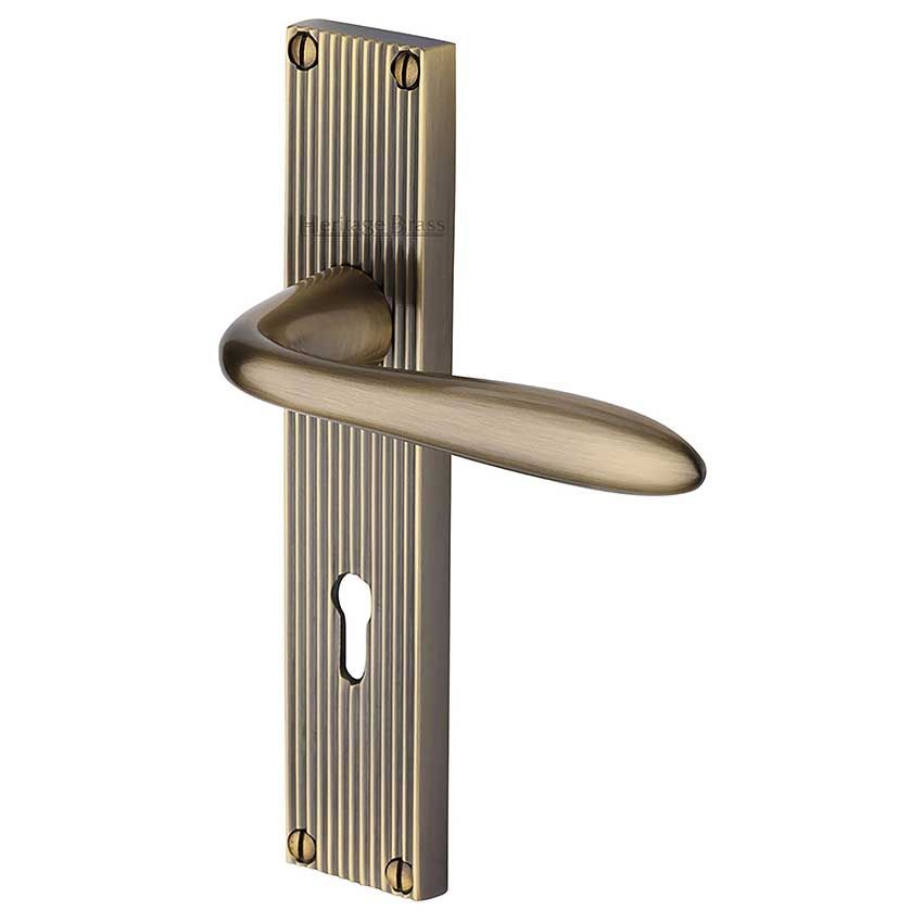Picture of Sutton Reeded Backplate Lock Door Handles In Antique Brass Finish - RR5000-AT-EXT