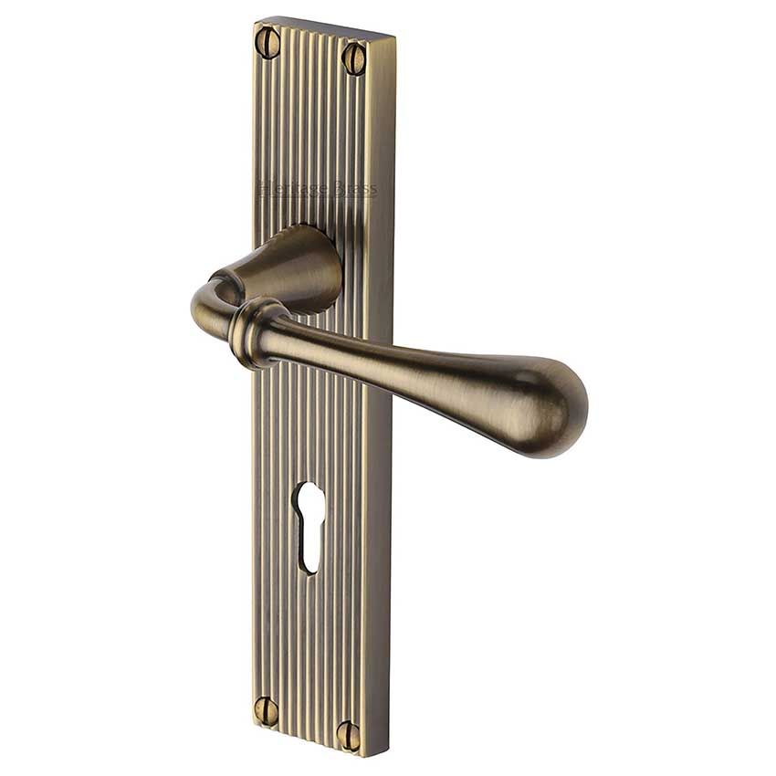 Picture of Roma Reeded Backplate Lock Door Handles In Antique Brass Finish - RR6000-AT-EXT