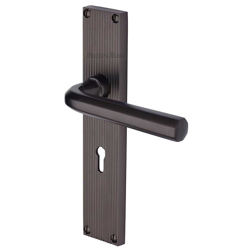 Picture of Octave Reeded Backplate Lock Door Handles In Matt Bronze Finish - RR3700-MB-EXT