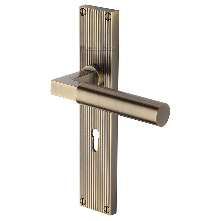 Picture of Bauhaus Reeded Backplate Lock Door Handles In Antique Brass Finish - RR7300-AT-EXT