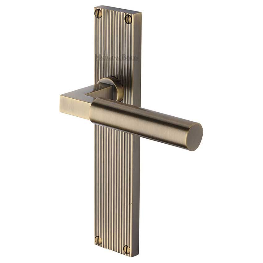 Picture of Bauhaus Reeded Backplate Door Handles In Antique Brass Finish - RR7310-AT-GP