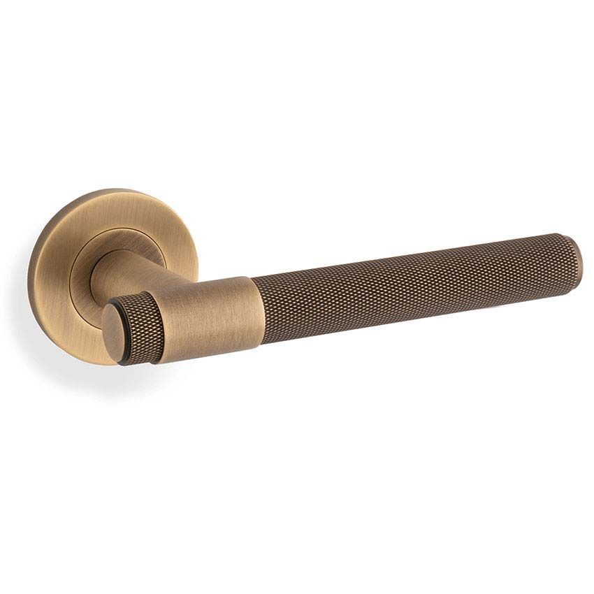 Picture of Alexander & Wilks Knurled Kingston Lever on Rose In Antique Brass - AW240AB