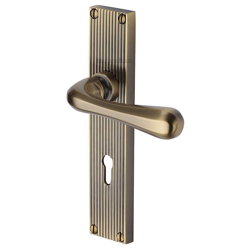Picture of Charlbury Reeded Backplate Lock Door Handles In Antique Brass Finish - RR3000-AT-EXT