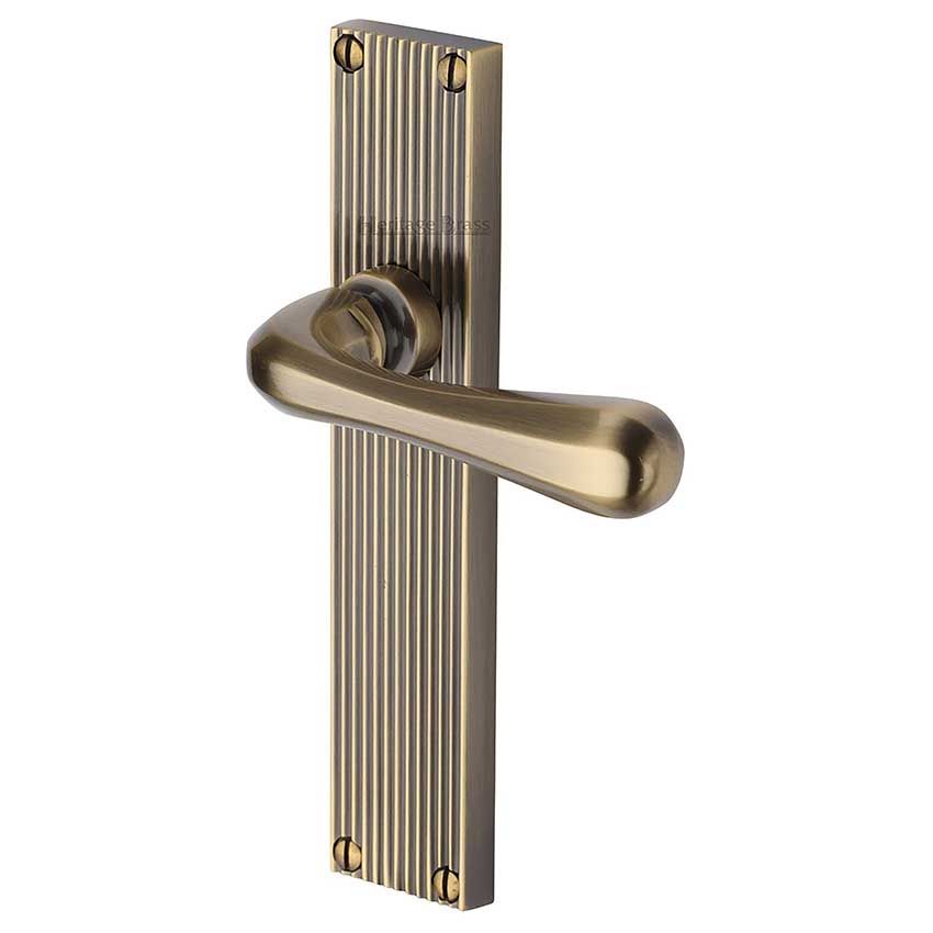 Picture of Charlbury Reeded Backplate Door Handles In Antique Brass Finish - RR3010-AT-GP