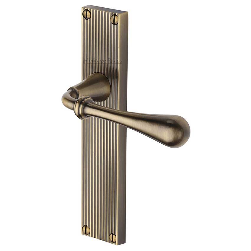 Picture of Roma Reeded Backplate Door Handles In Antique Brass Finish - RR6010-AT-GP