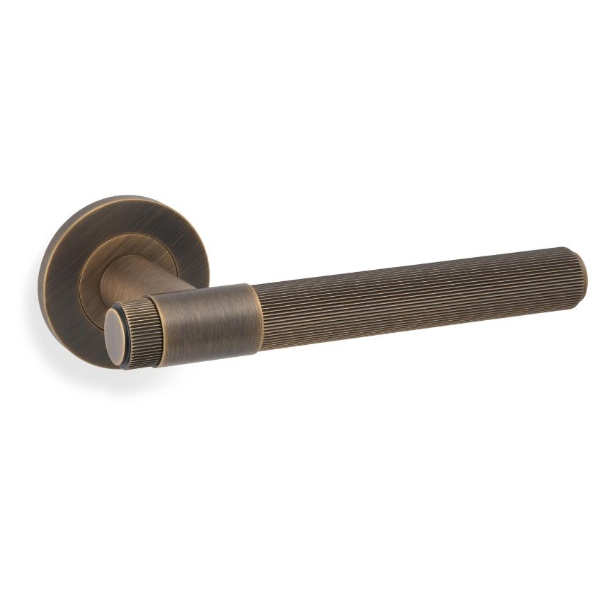 Picture of Kingston Reeded Lever on Round Rose - Antique Brass - AW242AB