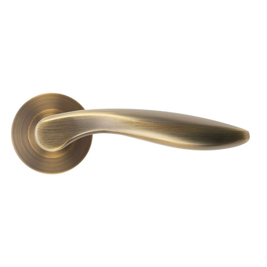 Picture of Cadiz Door Handle on a Rose In Antique Brass - ZPA060-AB