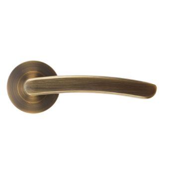Picture of Santiago Door Handle on a Rose in Antique Brass - ZPA020-AB