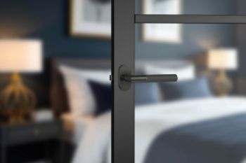 Picture of Knurled lever on an oval rose in powder coated black - DHKORMB