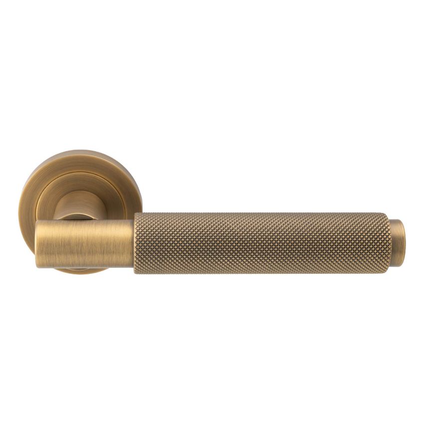 Picture of Varese Knurled Door Handle on Round Rose- Antique Brass - EUL050AB